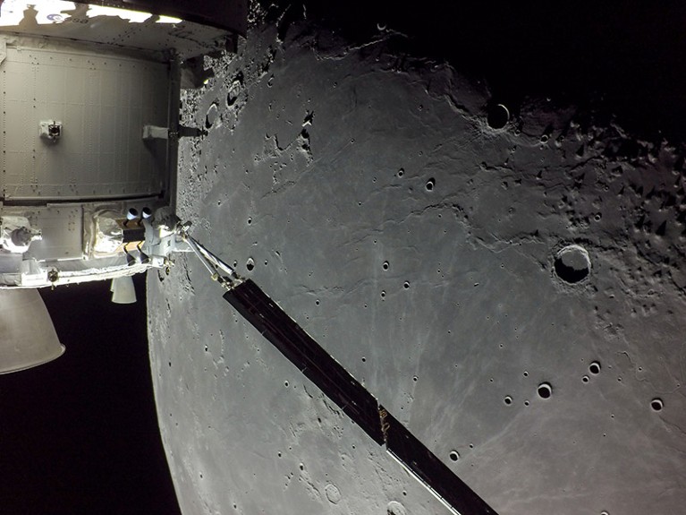 A portion of the far side of the Moon looms large just beyond the Orion spacecraft Dec. 5, 2022