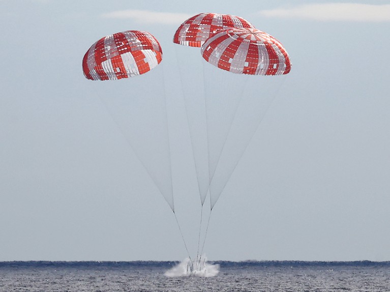 NASA's Orion Capsule splashes down after a successful uncrewed Artemis I Moon Mission, Pacific Ocean.