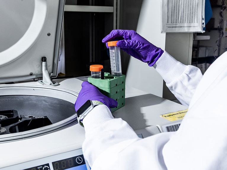 lab assistant works in a lab on the Amgen biopharmaceutical company campus