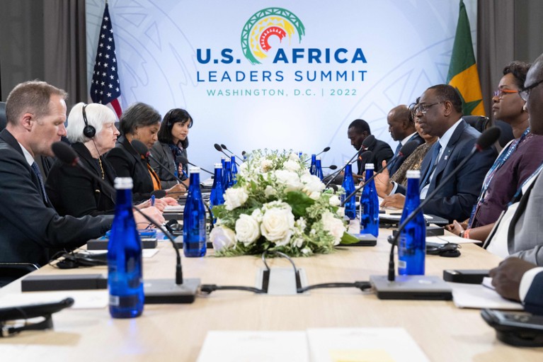 View down a table of a meeting during the US - Africa Leaders Summit