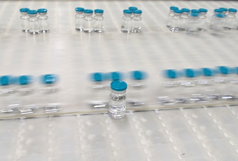 Clear bottles on a production line.