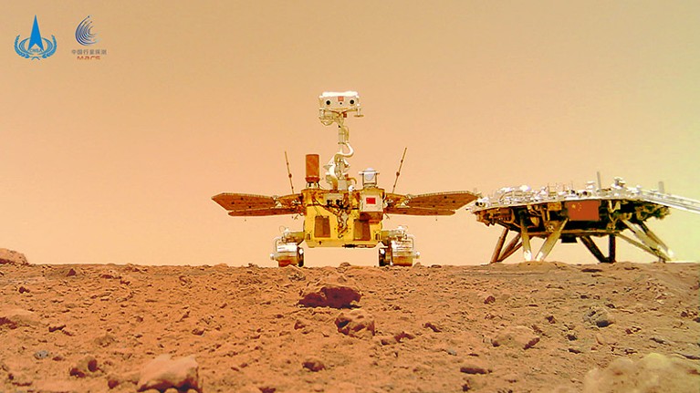 A selfie of China's first Mars rover Zhurong with the landing platform visible from the surface of Mars