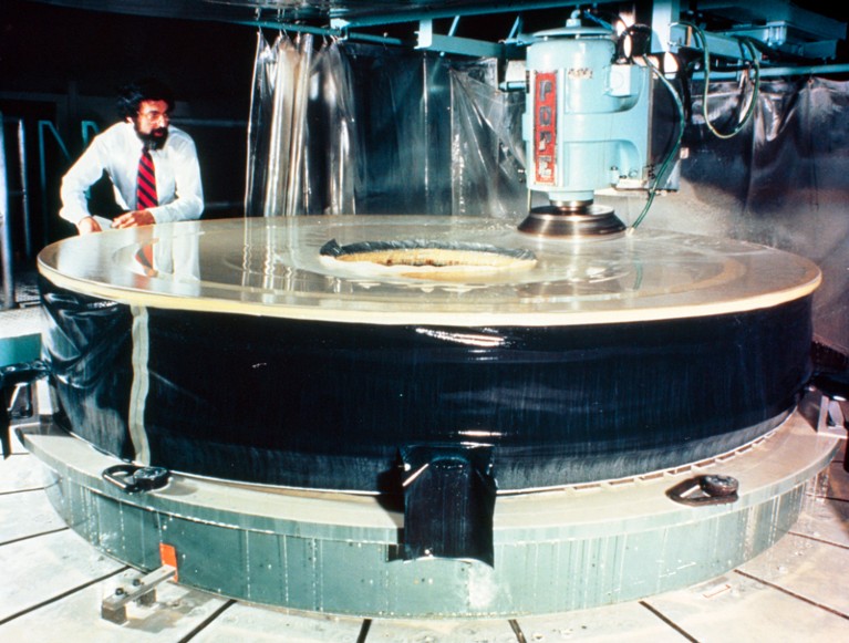 An archive image of the Hubble Space Telescope mirror being manufactured