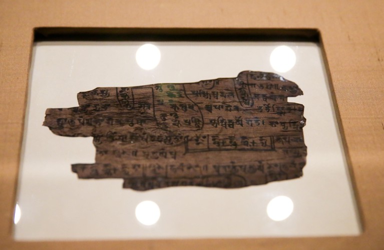 The Bakhshali manuscript displayed behind glass