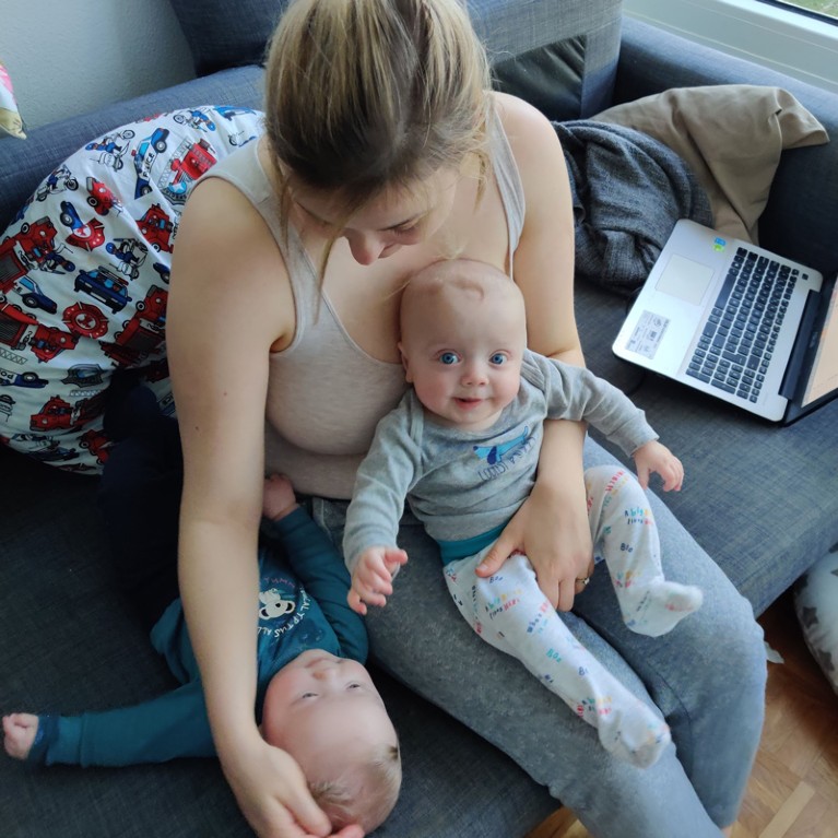 Kamila, postdoctoral fellow in Almouzni’s laboratory, with her twin babies is working from home.