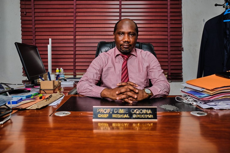 Portrait of Dimie Ogoina at his desk