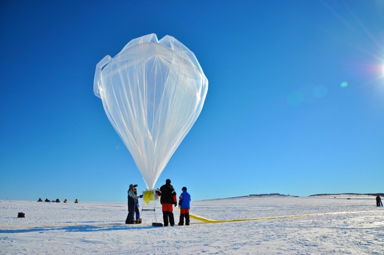A BARREL balloon floats into the sky as it is partially filled in Antarctica