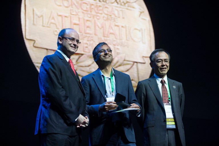 Akshay Venkatesh receives an award in mathematics