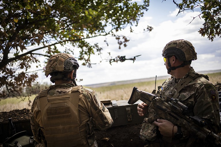 Ukrainian soldiers operate a drone near the front lines of the war with Russia, in Kherson region, Ukraine, Sept. 5, 2022.
