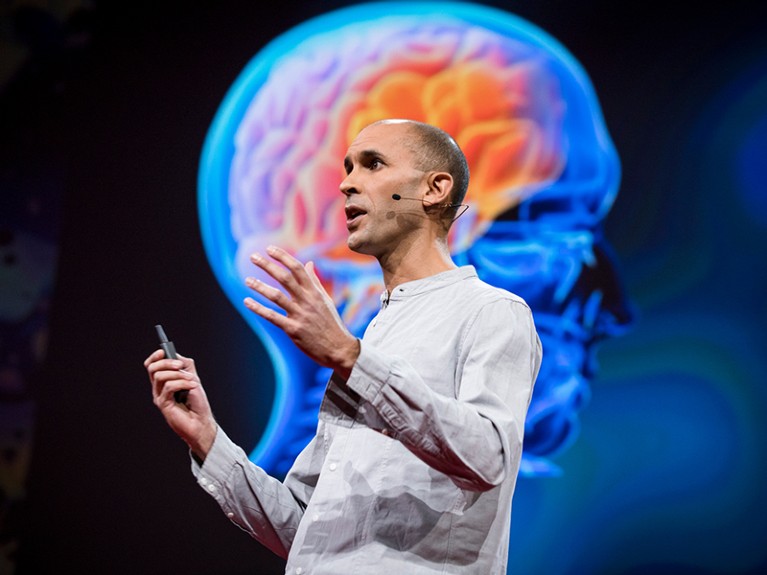 Anil Seth speaking during a TED event.