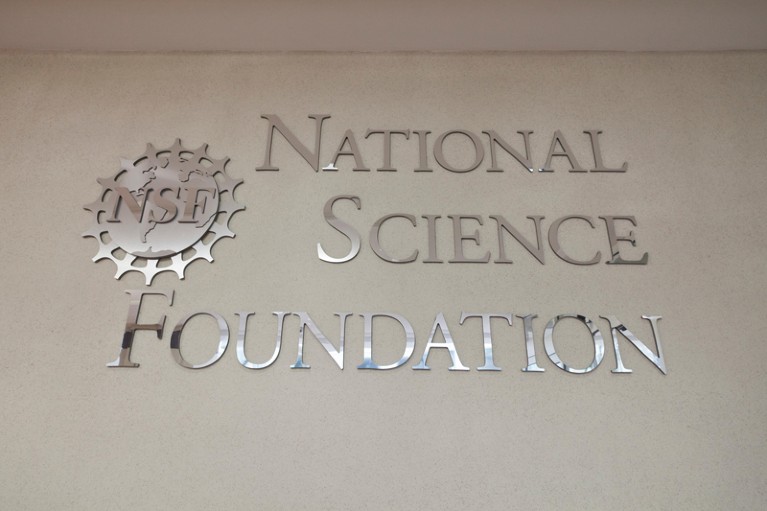 Close-up photograph of the National Science Foundation sign on a building wall