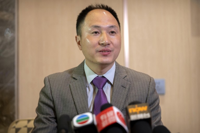 He Jiankui speaks at a press conference in Beijing