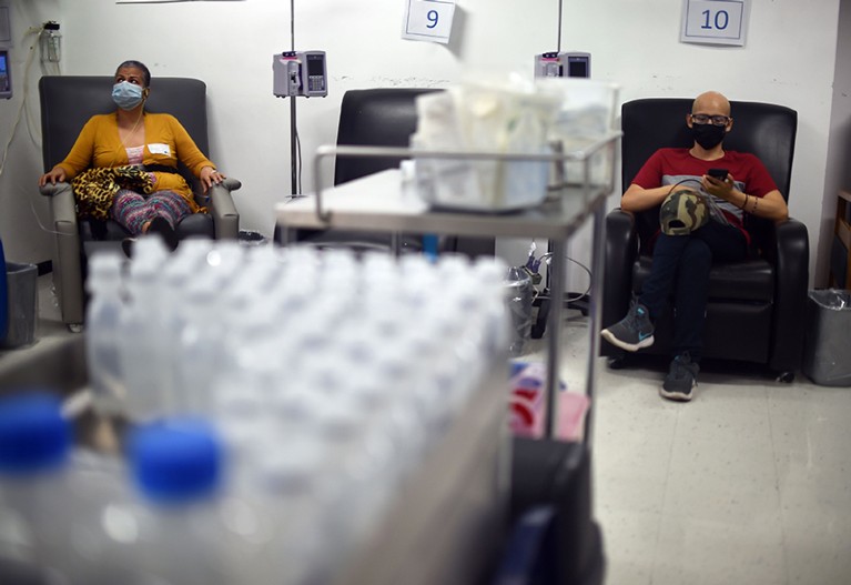 Cancer patient Luis Adrian Torreblanca (R) waits for his blood transfusion at Hospital Juarez in Mexico City.