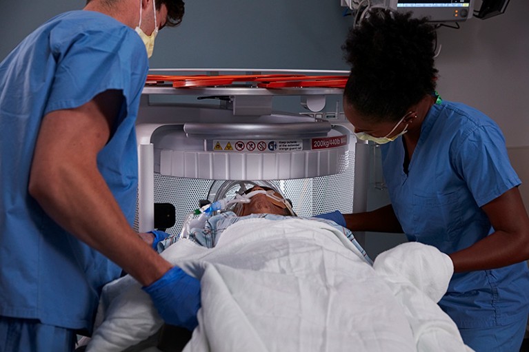 Moving a patient into position in a Hyperfine Swoop unit.