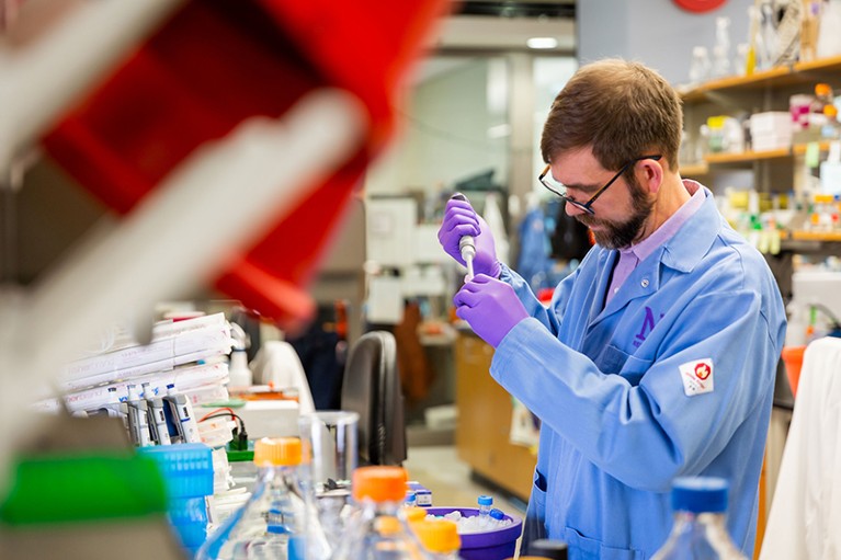 Michael Jewett at work in the lab.