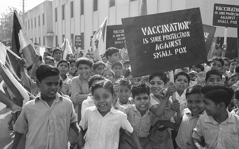 The WHO mass smallpox eradication campaign in India. Procession of schoolchildren carrying posters.
