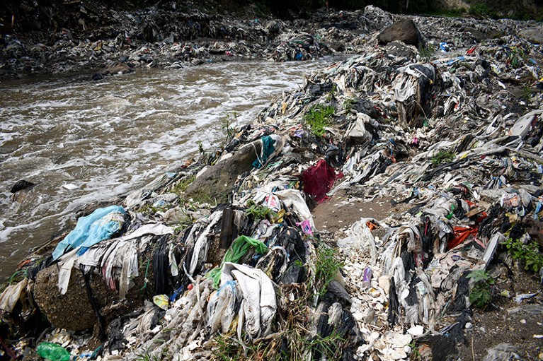 View of garbage on the banks of the polluted Las Vacas River in Chinautla, Guatemala.