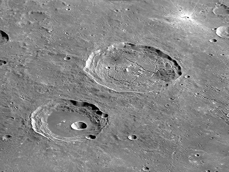 Oblique angle view showing craters Hercules and Atlas on the surface of the moon