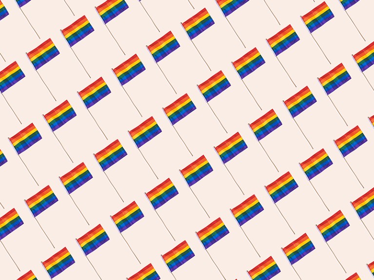 Lgtbiq community rainbow flag pattern with hard shadow on pastel background. Pride day concept.