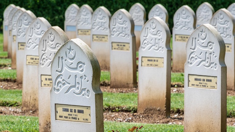 White war graves of Muslim soldiers, with Arabic script at World War I cemetery in Notre Dame de Lorette, France