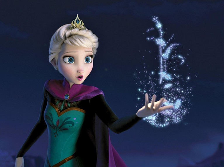 Blue sparks fly from the Elsa's palm in a still from the animated movie Frozen.