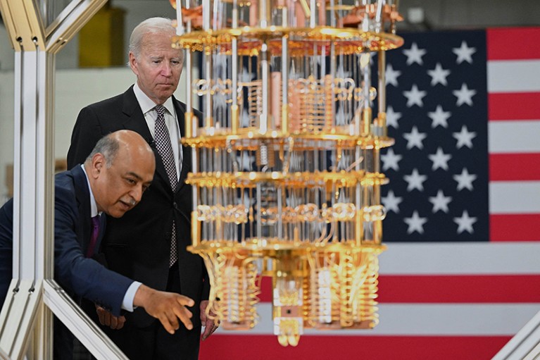 President Biden looks at a quantum computer with IBM CEO Arvind Krishna at the IBM facility in Poughkeepsie, New York.