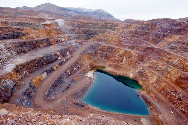 A general view of the Molycorp Minerals rare earth mine with a pool of water at the bottom