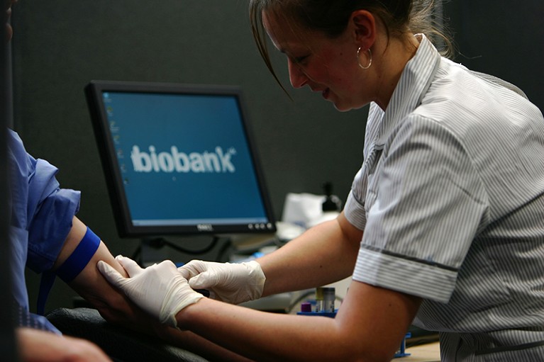 A nurse takes blood from a volunteer ready to be stored in the UK Biobank on April 17, 2007, Manchester, England.