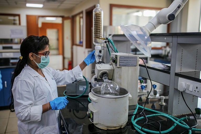 An employee works in a laboratory at a Laurus Labs Ltd. research and development centre Genome Valley in Hyderabad, India.