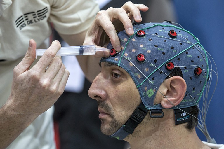 Andre Neyron wears electrode skull cap during the Brain-computer Interface Race during the First Cybathlon in 2016.