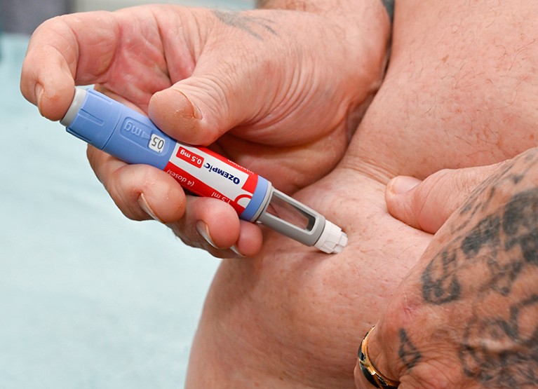 Close up view of a patient injecting Semaglutide medication.