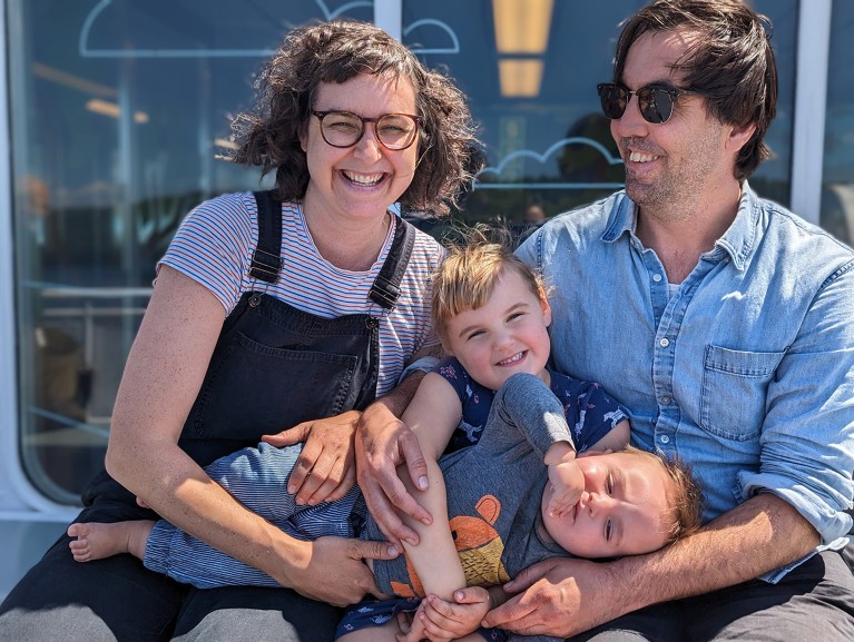 Tess Grainger with her husband and two young children