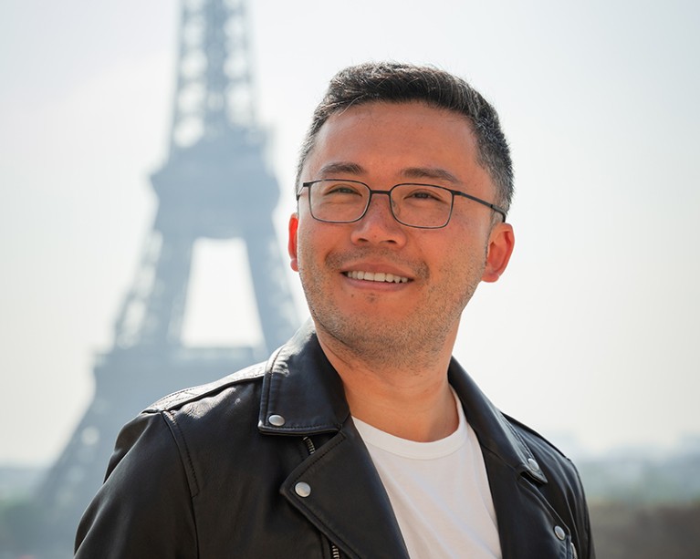 David Tang in front of the Eiffel Tower in Paris, France.