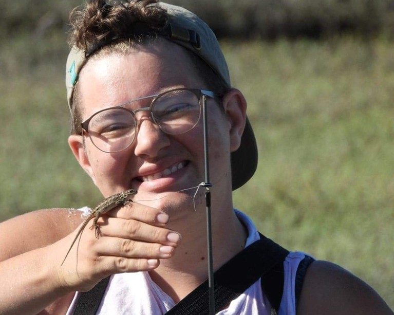 Jess McLaughlin with a western fence lizard they lassoed in the field and then released.