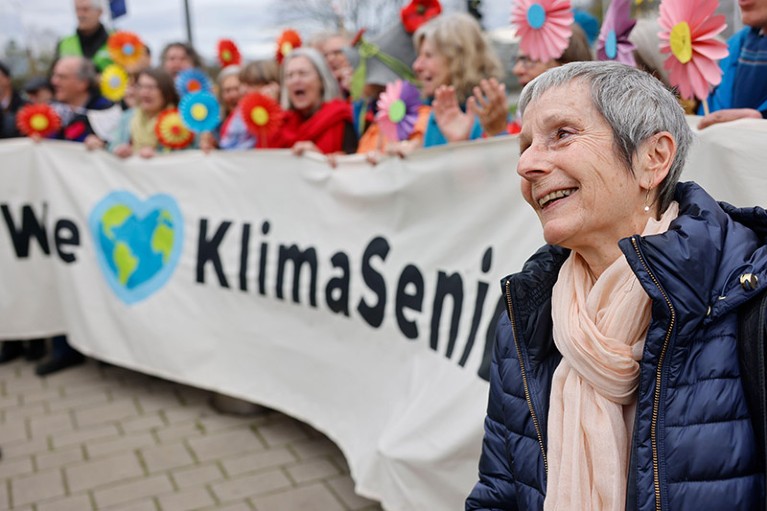 Anne Mahrer, co-president of KlimaSeniorinnen, reacts as Swiss retirees demonstrate outside the European Court of Human Rights.