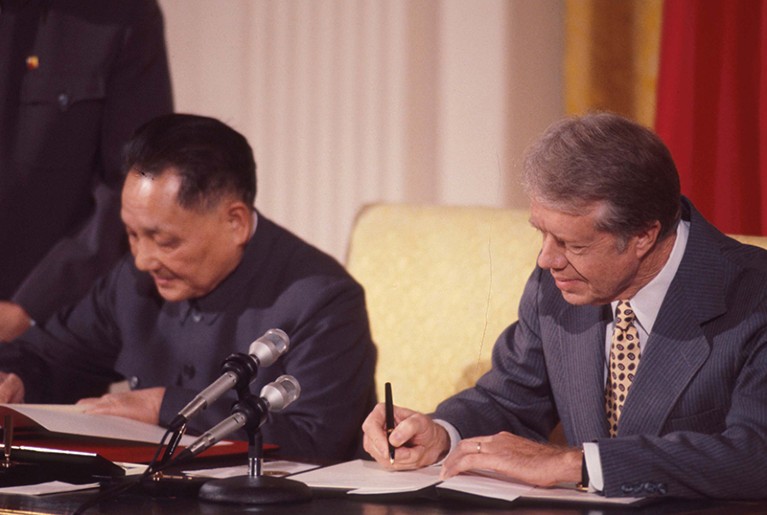 Premier Deng Xiaoping and President Jimmy Carter sign the agreement on cooperation in Science and Technology in 1979.