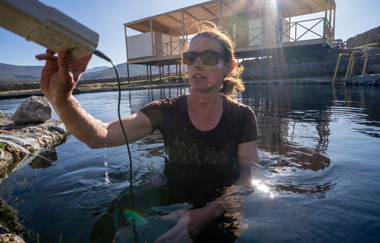 Microbiologist Karen Lloyd sampling subsurface-derived fluids in northern Chile.