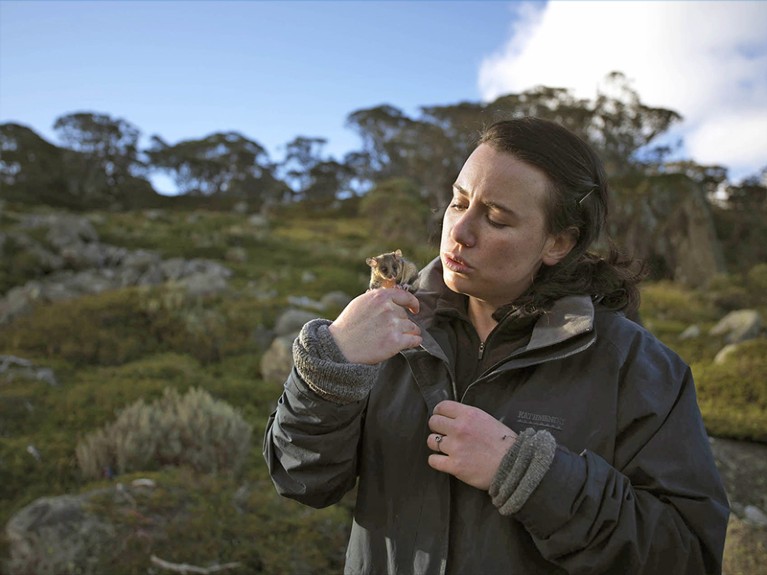 Hayley Bates with a possum.