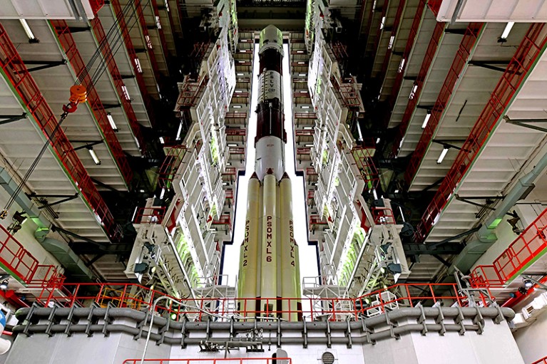 Rocket surrounded by gantries