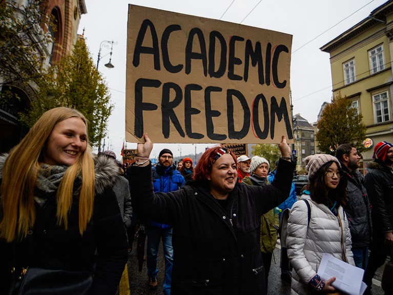 A student seen holding a placard during a protest in Hungary.