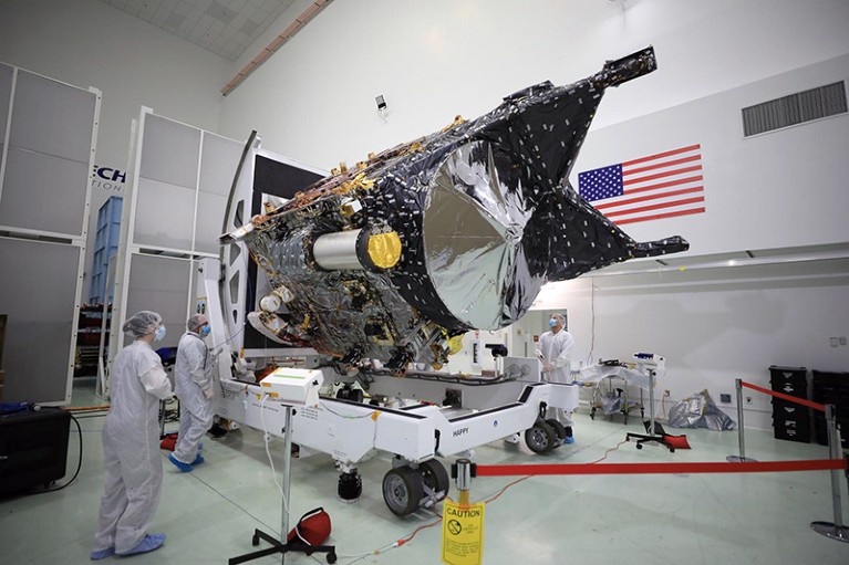 NASA's Psyche spacecraft in a clean room with technicians at Astrotech Space Operations Facility, Florida U.S.