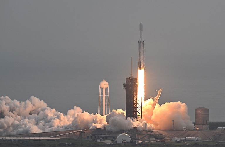 A SpaceX Falcon Heavy rocket with the Psyche spacecraft launches from NASA's Kennedy Space Center on October 13, 2023.