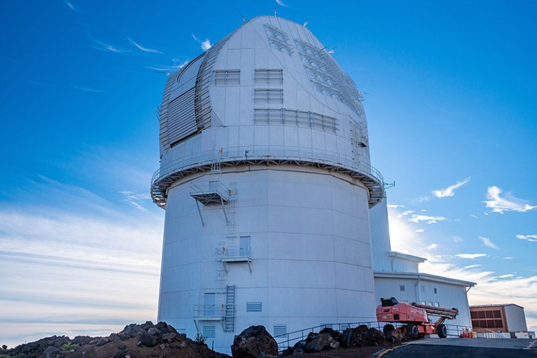 Inouye Solar Telescope with closed aperture against a blue sky