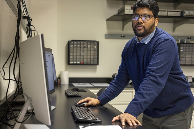 Ranga Dias working at a desktop computer.