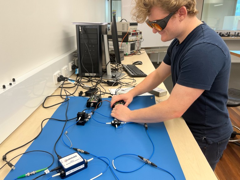 William Papantoniou works during a Quantum Devices and Computers Laboratory