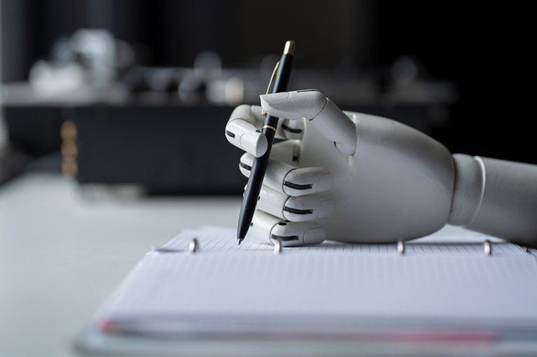 An artificial robotic arm write down some notes with pen.