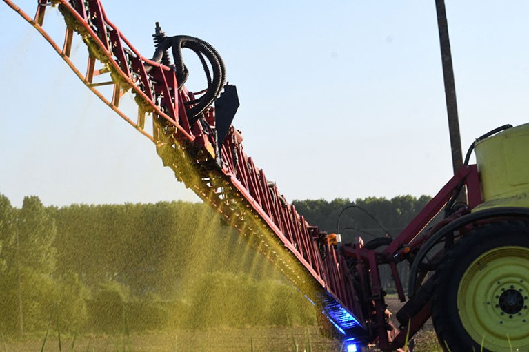 A French farmer sprays Roundup 720 glyphosate herbicide on a field of no-till corn in Piace, northwestern France.