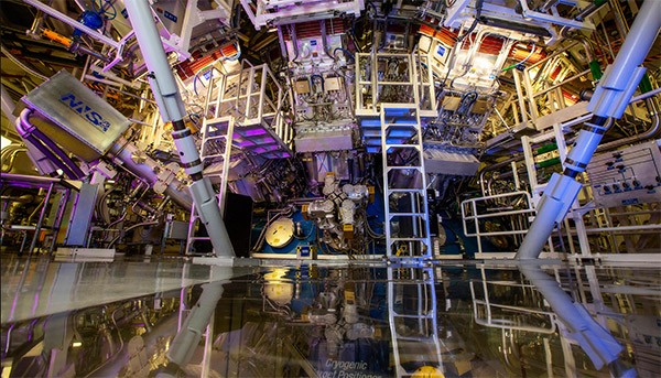 Interior view of the National Ignition Facility Laser System showing large struts ladders and framework