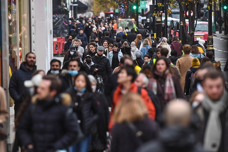 Crowds of shoppers are seen on Oxford Street on December 2, 2020 in London, England.