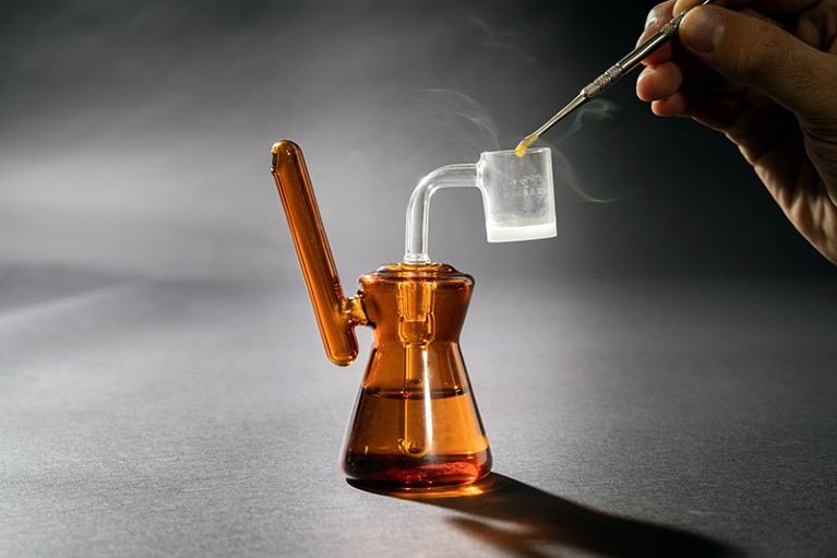 A dab rig burning a concentration of THC